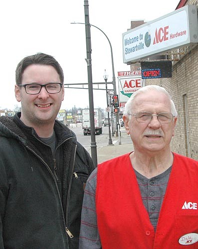 Sean Redmond, owner of Tiger Ace Hardware, left, and Dale Kangas, store clerk, stand near the store's new sign along Main Street in Stewartville last week. Last November, the city's Economic Development Authority (EDA)&#8200;unanimously approved paying Tiger Ace Hardware $907.50, or half the $1,815.00 the business needed to pay for a new "Tiger Ace Hardware, Welcome to Stewartville" sign for the front side of the business. "It looks good," Redmond said. "It's a nice change of pace. It's nice to brighten things up a little bit."