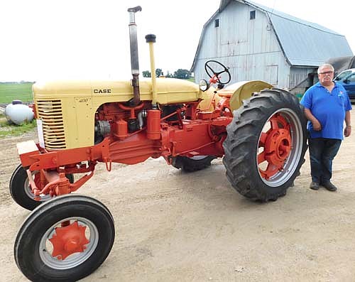 Phil Waugh of rural Stewartville put his restored 1955 400 Case tractor on display at the 37th annual Antique Engine & Tractor Show, sponsored by the Root River Antique Historical Power Association, on July 19, 20 and 21. "I wanted to show it off after I had it completely redone," Waugh said. "I was pretty proud of it after I got it restored." Case tractors were the featured machines at this year's Root River Show.