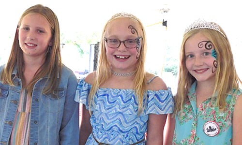 Payten Jacobs, center, was crowned queen of  this year's High Forest Old Settlers Day celebration. Payten is flanked by Lizza Post, left, runner-up; and Hannah Meyerhofer, right, queen of the 2018 High Forest Old Settlers Day. All three girls are fourth graders at Bear Cave Intermediate School. Payten and Lizza combined to sell about $4,000 worth of Old Settlers Day buttons, with the proceeds going to improve the HIgh Forest Square.