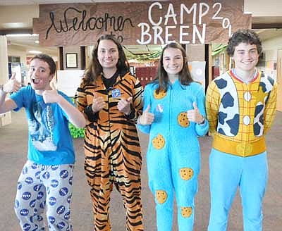 SHS&#8200;students celebrated the school's homecoming with Pajama Day on Monday, Sept. 23. Displaying their unique pajamas are, from left, Brady Ploenzke, a sophomore, wearing NASA pants and a spaceship shirt; Maddie Urban, sophomore, a tiger; Summer Barber, also a sophomore, "Cookie Monster,"&#8200;and Jacob Ramp, freshman, Woody from Toy Story.  Maddie said she enjoys dressing as a tiger.
