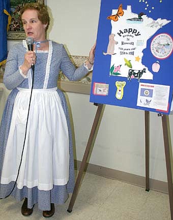 Ruby Bell, a Care Center employee, also wore 1800s clothing while speaking about a Care Center historical project. 