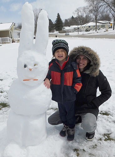 Krissy Sullivan of Stewartville and her son Maximus, 6, worked together on Monday, April 13, the day after Easter, to build an Easter snow bunny. Maximus did most of the work, Krissy said. "Mom had to help out a little bit," she said.