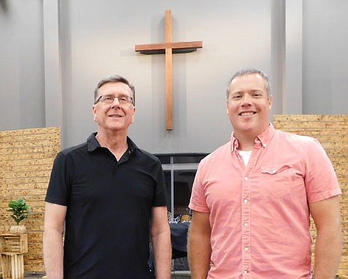 Andrew Langseth, a 2002 graduate of Stewartville High School, right, is the new lead pastor of Grace Evangelical Free Church. Dr. John Grams, left, who has served as the church's lead pastor for 25 years, will now be the church's "pastor emeritus."