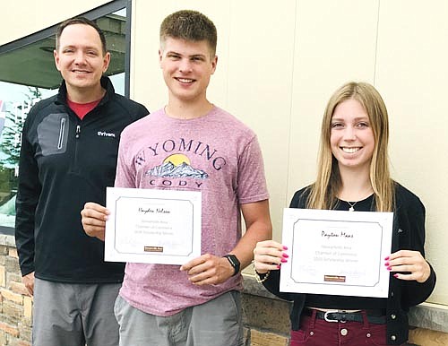 Hayden Nelson, center, and Payton Maas, right, members of the Stewartville High School class of 2020, have each received a $500 scholarship from the Stewartville Area Chamber of Commerce. Nelson plans to attend North Dakota State University. Maas will enroll at the University of St. Thomas. Nick Johnson of Thrivent Financial, president of the Chamber, left, congratulates the graduates.