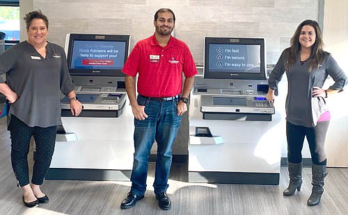 THE CREDIT UNION DIFFERENCE -- From left, First Alliant Credit Union- Stewartville branch employees Jessica Wampach, MEA-member experience advisor; Sunny Ahmed, MEA; and Hayley Howard, branch lead; stand near the Credit Union's cutting-edge, advisory supported kiosks.