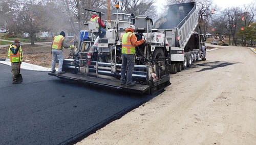 Workers from Elcor Construction paved Lakeshore Drive last week, part of the company's two-year project to fix seven northwest Stewartville streets beginning this summer and concluding in 2021. The work included complete reconstruction of a number of streets in 2020, including all of Lakeshore Drive and the west section of Second Street Northwest to Woodlawn Cemetery.