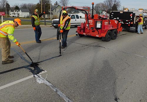 Crews from the Minnesota Department of Transportation sealed cracks on Hwy. 63 (Main Street) through Stewartville on Thursday, Nov. 19. "MnDOT is doing the work while there are warmer temperatures that allow the material to be properly applied onto the pavement," Mike Dougherty, communications director for MnDOT, said in an email. "The work helps to maintain and preserve the pavement for a longer lifespan."