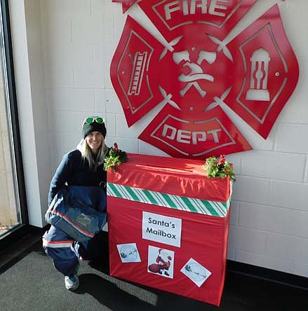 SANTA'S MAILBOX -- Local and area children are welcome to deposit their letters to Santa Claus into Santa's Mailbox at the entryway to the Stewartville Fire Hall. Jill Guy, a Stewartville mail carrier, is ready to pick up the letters and forward them on to the North Pole for Santa's viewing. This Saturday, Dec. 19, firefighters will drive Santa through town on a decorated ladder truck, said Lisa Jelinek, EMS director for the Stewartville Fire Department. The parade is scheduled to begin at 5:30 p.m. that day.