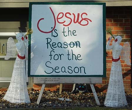 Residents who take a walk or drive around Stewartville will notice many signs of Christmas, including, two angels trumpeting Jesus as the reason for the season and several other holiday lights and decorations.