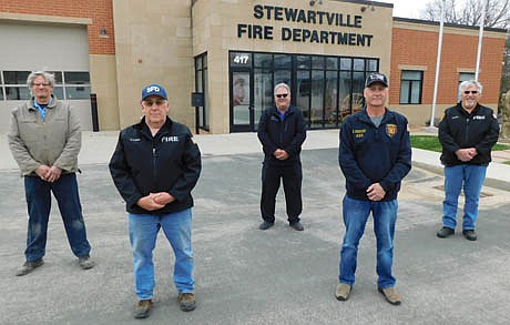With its longtime firefighters nearing retirement age, it may not be long before the Stewartville Fire Department doesn't have enough volunteers to cover daytime fires. The five veteran firefighters who have provided a total of 184 years of service while covering many daytime fires, and the number of years each has served on the Department, include, from left, Steve Denny, 41 years; Mike Podein, 30 years; Greg House, 43 years; Bob Robertson, 35 years; and Mark Podein, 35 years.