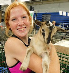 Mesa Wibben, a member of the High Forest Chippewa Champions 4-H Club who will be a senior at Stewartville High School, showed four goats at this year's Olmsted County Fair. "I really love goats in general," she said. They're really cute animals. I show with a lot of great people."  Above, she holds "Cinderella," a very young doe. "She's a doe too young to show," Mesa said.