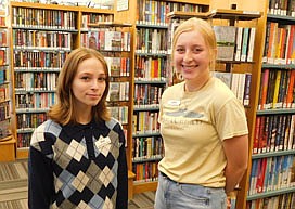 Ava Faupel, left, and Lydia Fryer, seniors at the Stewartville High School, are the new pages at the Stewartville Public Library.