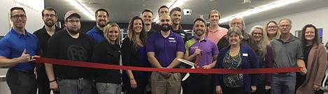  The Stewartville Area Chamber of Commerce recently hosted a ribbon-cutting ceremony for Anytime Fitness, which has moved to a new location at 1600 Second Ave. Northwest, near Pizza Ranch in Stewartville. The newly remodeled facility, an 8,300+ square-foot structure, will be open 24 hours a day, seven days a week with three suites, a full-size gym, free weight area, a purple-turf training area and a full-size private and group studio. Chamber members who welcomed Anytime Fitness to its new location include, from left, Jared Johnson of HALCON, Kevin Welter of Welter Entertainment, LLC and GEOTEK, Josh Ihrke of Pizza Ranch; Hunter Johnson, Kaitlyn Fischer and Joan Kopacz, all of ActivePT; Shawn Marg of Anytime Fitness, Dylan Smallwood of Elcor Realty of Rochester, Inc.; Zach Hodgson and Aaron Younge,along with owner Jameson Hanson, cutting the ribbon, all of Anytime Fitness; Dr. Kevin Hosch of 507 Family Chiropractic, Charlie Brown of PC Applications; Myrna Welter, Chamber membership coordinator, Peg Chihak of R & C Storage, Karli Young of Weekend Nirvana, Al Chihak of R & C Storage, and Megan Romens, Mary Kay sales director.