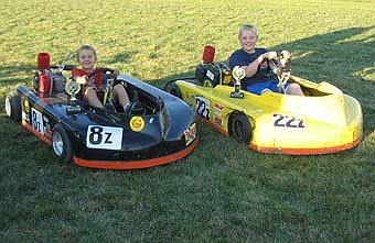 Ben Zahradnik (left) claimed third place in the feature race of his age group in Blue Earth on July 20. Older brother Nate Zahradnik captured second place in the feature race of his age group at Smith's Speedway in Hayfield on July 21. 