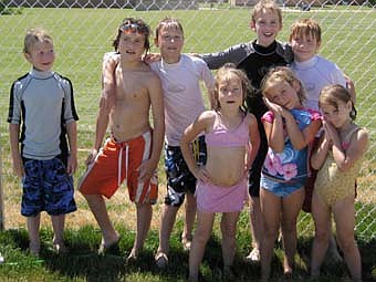 Van and Lori Beach's children, nieces and nephews recently visited the Stewartville pool. They include, front row, from left, Maya Krapf, 6; Maggie Beach, 5; and Malena Krapf, 4.  Standing in back, from left, Justin Beach, 7; Joey Krapf, 8; James Beach, 9; Jon Beach, 10; and Jack Krapf, 9.   