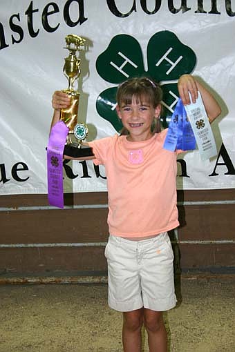 Amelia Welter, of the High Forest Chippewa Champions, champion novice showperson for swine. 