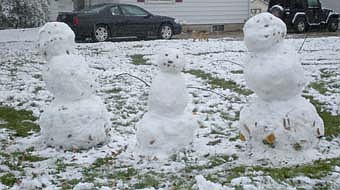 Early-season snowmen seen in Stewartville!!!! 