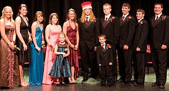 HOMECOMING MEMORIES -- The Stewartville High School Homecoming Court was featured at the annual homecoming dance at the SHS gym on Saturday evening,  Sept. 29. Members of the court are, from left, Wendi Irlbeck, Erin Ness, Vanessa Lawrenz, Ashley Titus, queen Jackie DeGeus, king Joe Dahl, John Himmer, Jake Flynn, Jake Olson and Paul Gehling.  Standing in front are junior escorts Jenna Nelson, left, and Andrew Steiger.                                                                               photo courtesy of Peters Photography 