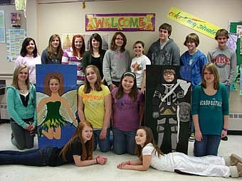 Mrs. Claudia Dreyer's homeroom students designed "Fairytale" cardboard cutouts for children to have their picture taken during the Early Childhood Carnival on Friday, March 4. They also created the signs and posters designating special activity areas.   Students from left, back row: Gabby Espinosa, Lauren Mikel, Caitlin Johnston, Sierra Flottum, Melanie Lex, Carly Wilde, Mitchell Bushman, Nick Lynch, and Sam Vandeloo. Middle: Brooke Bosshart, Crystal Piercey, Diana Humble, Hanne Jorgensen, Matthew Skifton, and Karissa Robinson. Front: Madisen Hart and Alice Chase.  Not pictured: Jasmin Hamlin.  