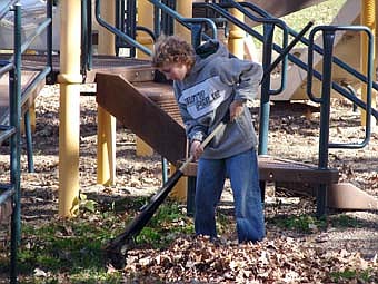 AUTUMN LEAVES -- Seventh-graders from Stewartville Middle School raked leaves at Florence Park as part of a community service project last Tuesday, Oct. 23. Seventh-graders also raked the park a year ago.  