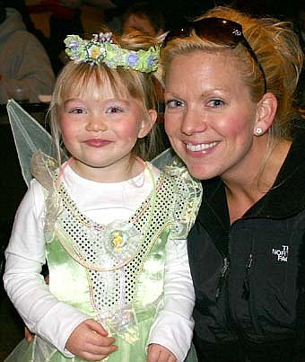 MOTHER AND DAUGHTER -- Carron Shubert of Kasson, formerly of Stewartville, brought her daughter Abygail, 3, dressed as Tinker Bell, to the Halloween party at the Stewartville American Legion on Wednesday, Oct. 31. 