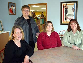 Horse Feathers Plaza business owners include, from left, Harla Morehart, Linda Bucknell, Suzie Diemer and Marcia Nagel. 