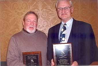 Don Mullenbach, left, and Darrel Jaeger have been named to the Southeast Minnesota Wrestling Coalition (SEMWREC) Hall of Fame. They were honored at a banquet at the Marriott Inn in Rochester on Monday, March 5. Mullenbach placed second in the state in 1963 and third in 1964 as a wrestler at Stewartville High School while Jaeger was an assistant wrestling coach at SHS. Jaeger coached wrestling at SHS for 26 years, including 18 as a head coach. His teams compiled an overall record of 166-72-7. 