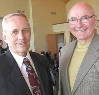 Robert Foss, a 1959 graduate of Stewartville High School, former Stewartville mayor and councilperson and a long-time business executive, left, was the featured speaker at the Stewartville Area Community Foundation's annual dinner of Sunday, April 15. Bruce Trulson, chairperson of the Foundation, is at right. 