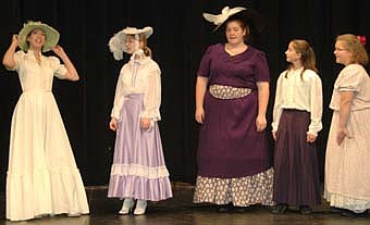 The Pick-a-Little Ladies, including, not necessarily in order, Chelsea Lloyd, Rachel Mann, Molly Giehtbrock, Tiffany Titus and Ashley Titus, pick a little and talk a little more during a dress rehearsal for the Stewartville School District's production of "The Music Man."  