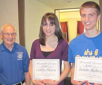 Caitlyn Nienow, above center, and Jason Robey, above right, have earned $300 college scholarships from the Stewartville Kiwanis Club. Ron Olson, president of the Kiwanis, above left, announced Nienow and Robey as the scholarship recipients at the annual Kiwanis Club breakfast to honor members of the Key and Builders clubs last week. Robey also earned a Kiwanis Minnesota Dakotas Region 7 scholarship. 