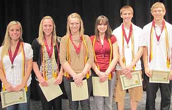 Stewartville High School seniors graduating with highest honors (3.9 grade point average or higher) who were honored at the SHS Academic Awards Assembly on Tuesday, May 15 include, from left, Nicole Amos, Jackie Betcher, Sydney Flottum, Caitlyn Nienow, Jason Robey and Austin Rosenblad. Matt Welter, another highest honors student, was not available when the photo was taken.  