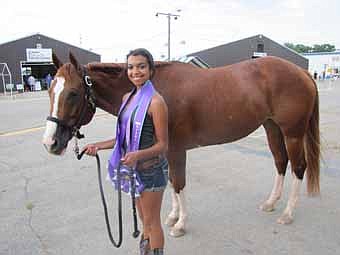 Shanalyn Bird, 16, showed her horse. "Caught U Peekin," which was named grand champion in English Equitation and showmanship 