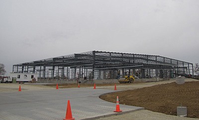 The new FedEx package distribution center is beginning to take shape in the Schumann Business Park. The 60,000 square-foot structure is being built on about 7.5 acres of land in the park, located west of Kwik Trip North in north Stewartville. Barb Neubauer, city finance director, has said that the new business is expected to hire about 30 employees.