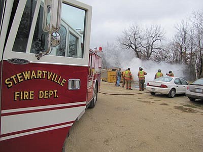 Stewartville Firefighters on the scene of a brush fire in SW Rochester.
