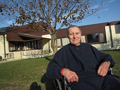 Walter Mount, who turned 100 on Wednesday, Oct. 3, relaxes near Ostrander Care and Rehabilitation, his current home. 