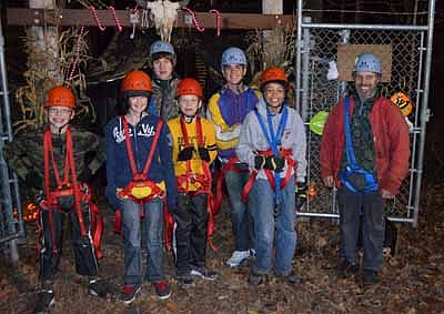 Scouts from Troop 56 enjoyed an evening of "Haunted High Ropes" at Eagle Bluff on Friday, Oct. 26. Pictured from left are Jacob Edholm, Dylan Riess, Teddy Darga, cub scout Nathan Edholm, David Rysted, Brandon Clarke, and scoutmaster Ted Darga. 