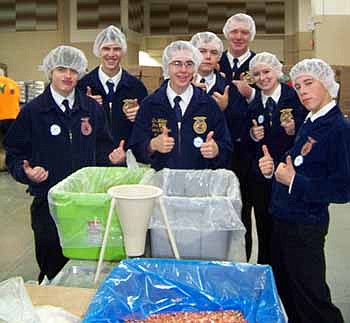 Stewartville FFA members were excited about their service project packaging meals for people in need during their trip to Indianapolis. Pictured in no particular order are Kenny Dux, Kyle Sivesind, Tyler Schoenfelder, Troy Vetsh Eleni Solberg Grant Brass, Dillon Welter 