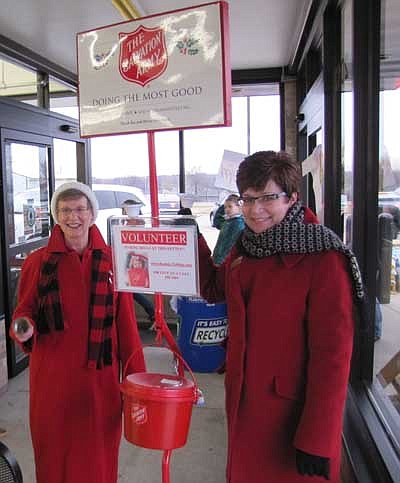 State Sen. Carla Nelson, right, rang bells for the Salvation Army at Fareway of Stewartville on Friday, Dec. 7. Ardis Copple of Stewartville, left, took over the bell-ringing after Nelson finished her shift.   