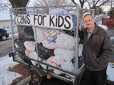 Sam Giehtbrock, who works with technology for the Stewartville School District and is the set director for Stewartville High School and Middle School plays, has been collecting and cashing in aluminum cans to raise money for school groups and organizations for six years. "This is something that I do because I like to help kids," he said. "I'd do anything for kids."     