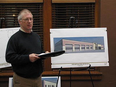 Steve Gausman, president of Five Bugles Design of Eau Claire, Wis., presented plans for Stewartville's new Fire Hall to the Stewartville City Council and a number of Stewartville firefighters last week. Gausman estimated that construction costs for the new building will be slightly less than $1.8 million.  