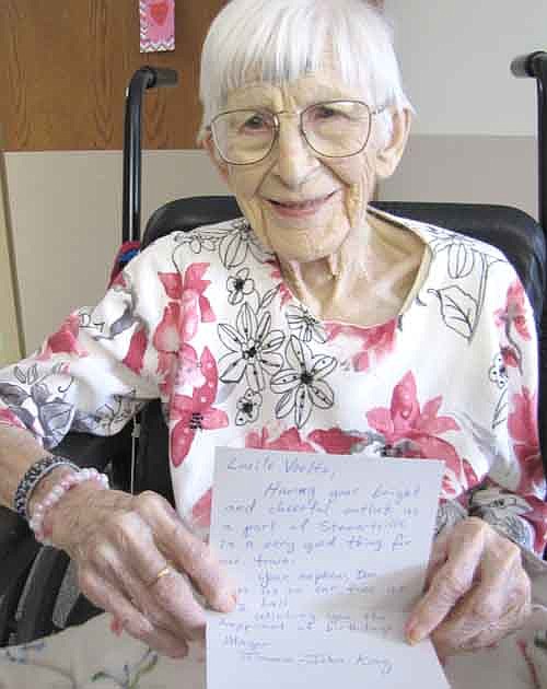 Lucile Voeltz, who turned 101 at the Stewartville Care Center on Friday, Feb. 8, holds a letter of congratulations she received from Mayor Jimmie-John King.