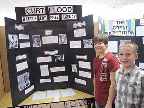 Nathan Johnson, left, and Braxton Ramaker worked on a project that focused on Curt Flood's role in bringing free agency to Major League Baseball.