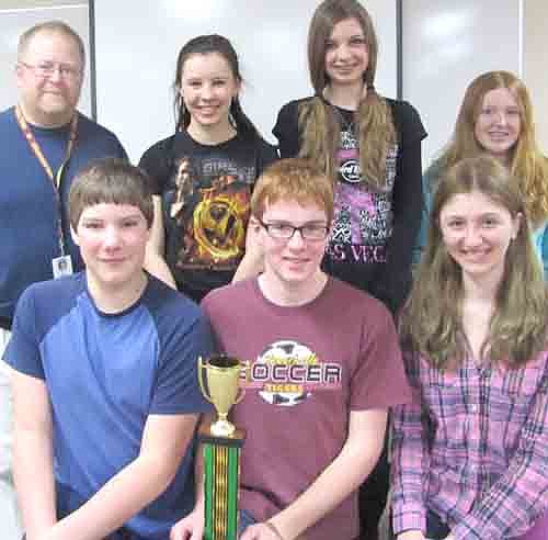 Stewartville's eighth-grade Academic Triathlon team qualified for the state meet by winning the regional meet at Byron on Friday, March 1. Team members include, front row, from left, Morgan Wildeman, Graham Mueller and Candi Quandt. Back row, from left, Todd Johnson, coach/advisor; Jessica Pedelty, Emily Majerus and Julia Lanzel.
