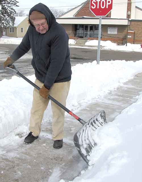 Stan Antonson, who lives along Second Avenue Southeast, shovels the sidewalk near his home after a winter storm dumped about nine inches of snow on Stewartville on Tuesday, March 5. Snow has affected Antonson since the day of his birth. "On the day I was born, there was 22 inches of snow," he said. "That was in 1935. I was born north of St. Charles, and the doctor couldn't get to the house (because of the snow.) A neighbor lady had to deliver me." Last week, he had only a few words to say about Stewartville's most recent snowstorm. "I'm ready for spring," he said.