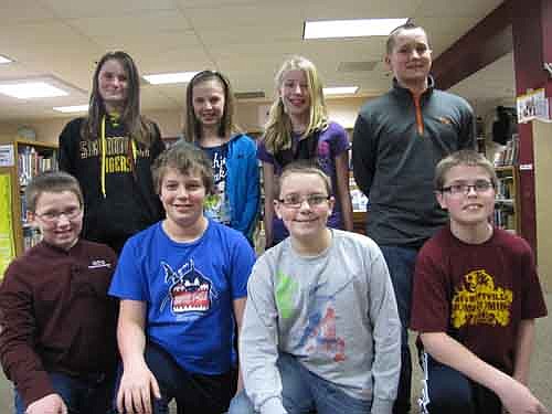 Two Stewartville sixth-grade teams performed admirably at the Math Masters competition in Rochester on Friday, March 8. Members of the first-place team include, front row, from left, Ethan Humble, Daniel Schimke, Nathan Laures and Zack Gulbranson. The third-place team, in back, from left, includes Emily Schlechtinger, Laura Pedelty, Ellie Fryer and Shane Byrne.