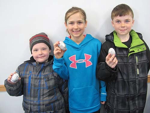 Three contestants won top prizes for finding silver eggs at the Racine Lions Club Easter Egg Hunt at the Racine City Hall-Community Center on Saturday, March 30. Winners include, from left, Cole Underwood, 6, of Racine, who won a $50 Wal-Mart gift card; Shelby Beck, 9, of Spring Valley, who won a $75 Wal-Mart gift card; and Jackson Helget, 10, of Racine, who won a $100 gift card, also to Wal-Mart.