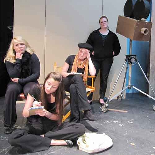 Adriana Nelsen-Gross (Keri), in foreground, along with Madelyn Miller (Kaitlin) seated at left, and Calli McCartan (Lena), seated at right, discuss ideas as Monika Anderson (Brooke) looks on in the background during a dress rehearsal for Stewartville High School's upcoming presentation of The Bold, the Young and the Murdered to be presented at the SHS Performing Arts Center beginning this Friday, May 10 at 7 p.m.