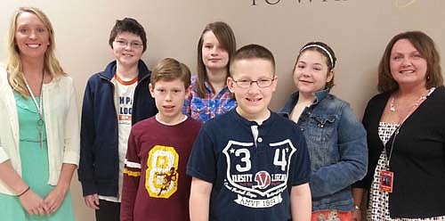 The Stewartville Kiwanis Club sponsors a Terrific Kids program to honor Stewartville Middle School sixth graders for working hard and displaying a positive attitude at school. Terrific Kids for April include, front row, from left, Gabe Nelson and Ethan Humble. Back row, not necessarily in order, are Emma Probach, Lydia Thompson and Audrey Miller. (Justin Schlectinger, another Terrific Kid, is not pictured.) Hailey Johnson, far left, and Sheila McNeill, far right,  are members of the Kiwanis Club who work for Stewartville schools.