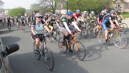 Joel Raygor of Stewartville took part in the Almanzo 100 bicycle race on Saturday, May 18. Raygor and his small group of riders joined about 1,000 others in an event that started in Spring Valley and stretched across the gravel roads of southeastern Minnesota. Above, the cyclists begin their trek in Spring Valley.