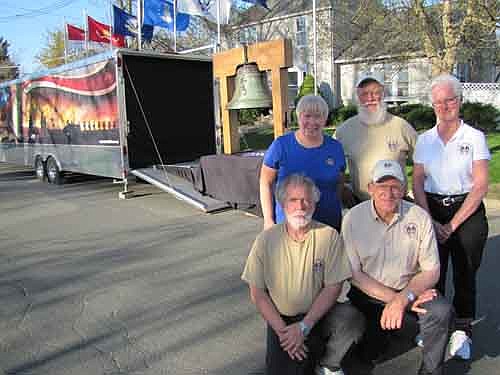 Members of the Bell of Honor Committee brought the bell and its trailer to the Griffin-Gray Funeral Home to pay tribute to Walter Mount, a Stewartville veteran, on Tuesday, May 14. Mount, 100, died five days before. Committee members include, front row, from left, Jan Throndson of Rochester and Dale Wellik of Dodge Center. Back row, from left, Sandy Sabin, Dick Denny and Dorothy Denny, all of Rochester. Throndson said that it's a privilege for him and the other committee members to pay tribute to America's veterans. "We now stand for those who stood for us," he said.